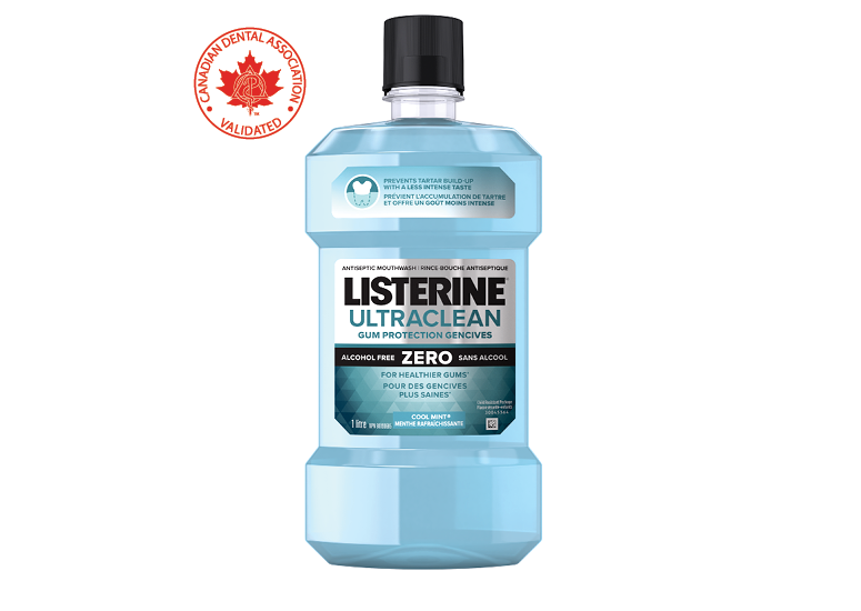 A bottle of LISTERINE® Gum Protection Zero Mouthwash, 1L with a logo of the Canadian Dental Association approval in the background.