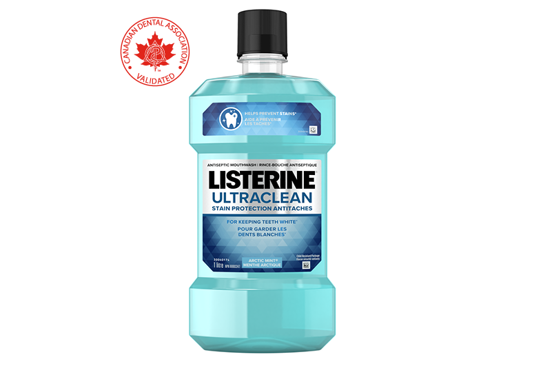A bottle of LISTERINE Ultraclean® Stain Protection Mouthwash, 1L with a logo of the Canadian Dental Association approval in the background.