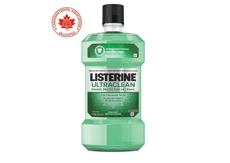 A bottle of LISTERINE Ultraclean® Enamel Protection Mouthwash, 1L with a logo of the Canadian Dental Association approval in the background.